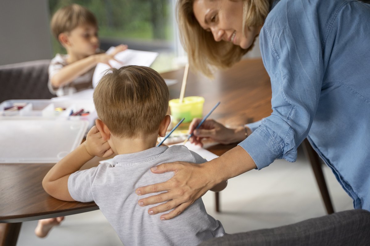 kids drawing with the help of their mother kids drawing with the help of their mother